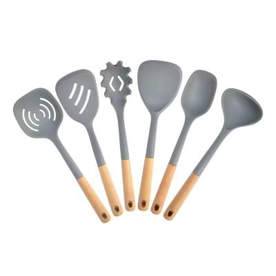 China Sustainable Cocina Kitchenware Silicone Kitchen Utensils Set With Wooden Handles Cooking Tool Kit for sale