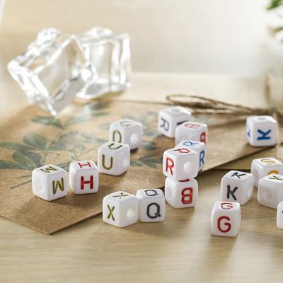 China New Design Acrylic Letter Beads Wholesale White Base Colorful Flat Round Acrylic Letter Beads for sale