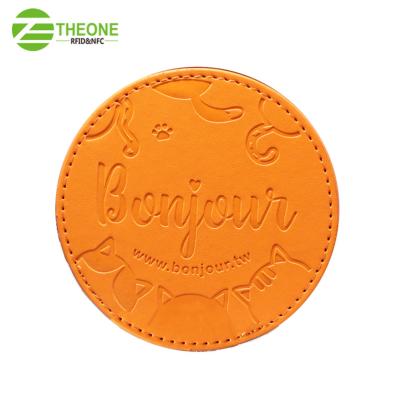 China Sustainable Promotion Gift NFC 213 Coaster Round PU Leather Brown Color With Custom Logo for sale