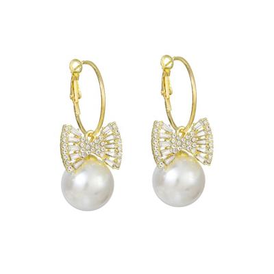 China Trendy Shining Pearl Fashion Movable Butterfly Earrings Crystal BowKnot Hoop Earrings White for sale