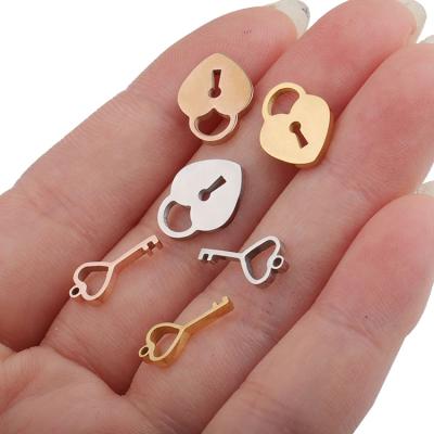 China High quality UK daily wear lovers stainless steel heart pendant pendant lock and key componenets PVD plated charms for sale