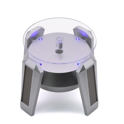 China Rotate 360 ​​Degree UFO Solar Display Turntable With Blue Light 360 Rotating Desgree Display Stand for sale