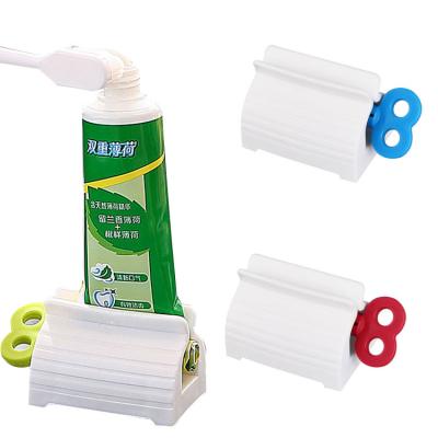 China Viable Wholesales Rolling Toothpaste Squeezer Acceptable Customization Lazy Toothpaste Dispenser For Bathroom for sale