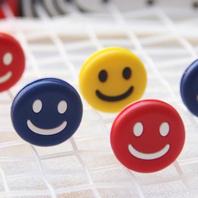 China Custom Hot Selling Durable Outdoor Sports Accessories Cute Smile Face Silicone Tennis Dampener for sale