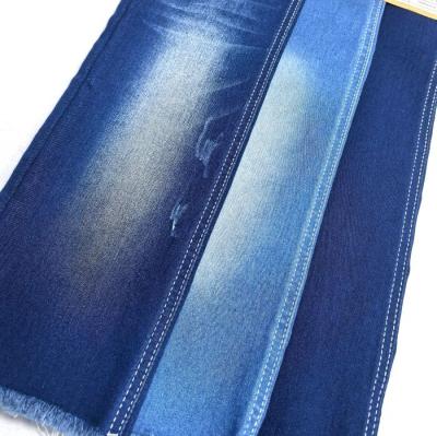 China Indigo Blue Satin Good Stretch Denim Fabric With Ready Stock For Legging Pants for sale