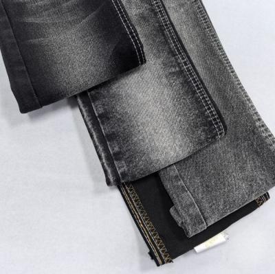 China Zwart Kleur Goed Stretch 13OZ AW Zwaargewicht Twill Denim Stof Voor Man Jeans Te koop