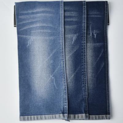 Chine 11 oz de tissu denim étirable en coton polyester spandex résistant au rétrécissement à vendre