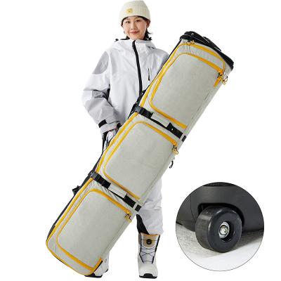 China Anti-Theft Inson High Quality Custom Light Brown Nylon Snowboard Travel Waterproof Adjustable Length Ski Bag With Wheels for sale