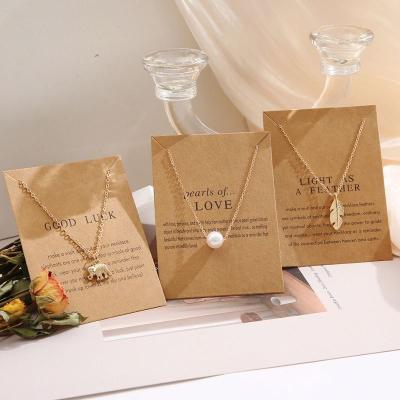 China Wholesale FASHIONABLE Thin Chain Pearl Feather Clavicle Chain Fetro Tasty Pape Card Butterfly Elephant Cat Letter For Women Jewelry for sale