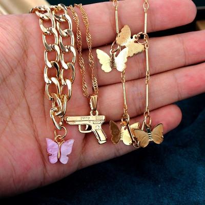 China TRENDY Gold Plated Aolly Gun Aolly Gun Pendant Necklace Multi Layer Chain Butterfly Jewelry for sale