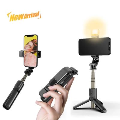 China Mini Portable Hot Series Mini Bluetooths Wireless Folding Selfie Stick Folding Telescopic Selfie Stick With Fill Light L10s for sale