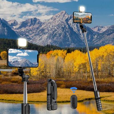 China Folding Mini Portable 360 ​​Flexible Selfie Stick, Invisible Moving Selfie Stick Case Q11s with 3 Colors Lights for sale