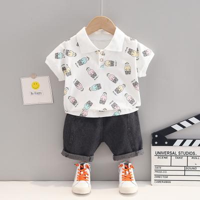 China Kids Summer Baby Boy Clothes Solid Color Printing Cartoon Boy Casual Full Set Short Sleeve Denim Shorts Kids Clothing 2 Piece Set for sale