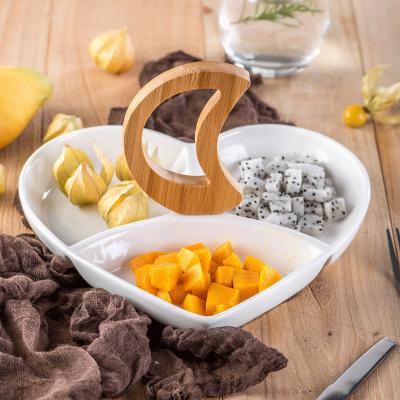 China Home Viable Home Snacks Heart Shaped Ceramic Mixing Tray Multi-cell Dried Fruit Tray Living Room Ceramic Dish for sale