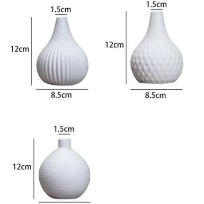 China Small Minimalist Ceramic Aromatherapy Vase Tall Simple Vertical Ceramic Ornamental Flower Vases Home Decor for sale