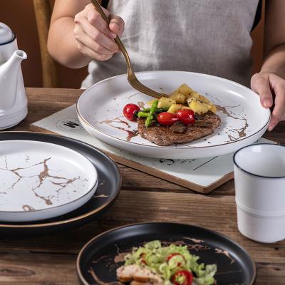 China 10 Inch Retro Dinner Plate Round Steak Matte Ceramic Marble Gold-Patterned Sustainable Nordic Style for sale