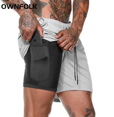 China Custom Anti-Wrinkle OWNFOLK Logo Shorts For Men Workout Running 2 In 1 Gym Double Decker Training Shorts With Pockets Nets Shorts for sale