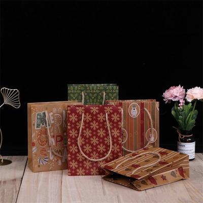 China Best Selling High Quality Recyclable Kraft Paper Bag Wholesale Customized Christmas Paper Gift Wrapping Bags for sale