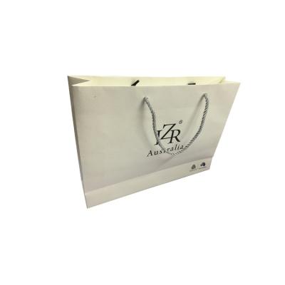 China Handmade Custom Design Luxury Paper Bag Printing Wholesale Hot Custom Gift Bags Logo Shopping Bag With Handle for sale