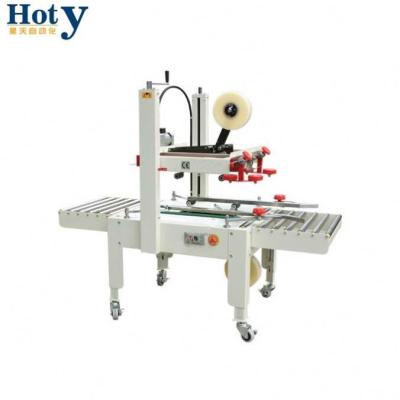 China Convenient Food CLOTHING Carton Box Hot Melt Glue Sealing Machine for sale