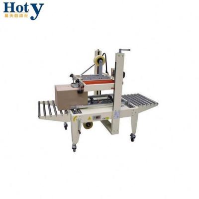 China CLOTHING good quality cling film wrap low price hermetic sealing machine for sale