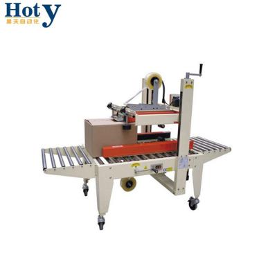 China machinery & HOT SELLING Hardware Semi-automatic Right And Left Belt Driven Carton Sealer for sale