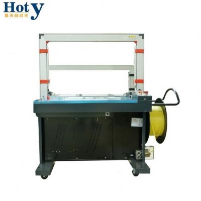 China Practical CLOTHING Strapper Cardboard Corrugated Box PP Strapping Machine for sale