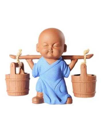 China Purple Farmer Monk Pottery Clay Ornaments China Small Figurines Garden Small Figurines for sale