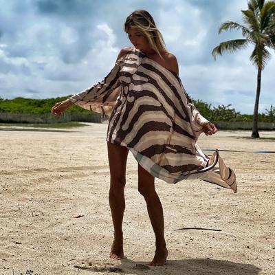 China Newest Anti-Static Sexy Beach Dress Summer One Shoulder Vacation Beach Leisure Swing Printing Big Swing Dress For Women for sale