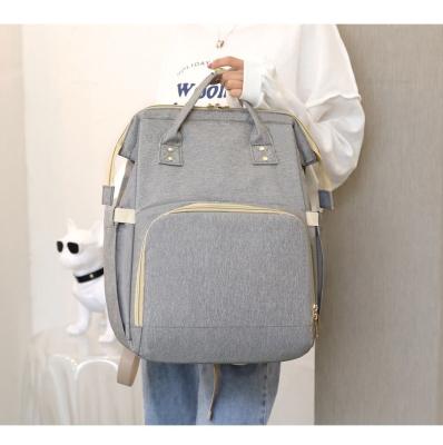 China Stylish Multifunctional Water Resistant Canvas For Mother Fashionable Diaper Bags Wholesale With Changingstation Mat Backpack Diaper Bags for sale