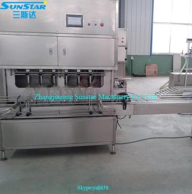 China Chemical Automatic Linear Type Palm Oil Packaging Machine For Olive Cooking Sunflower Oil In Barrel Or Bottle Jar Can for sale