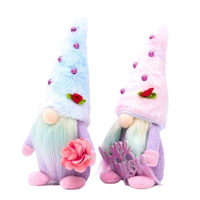 China 100% Eco-friendly Handmade Cute Purple Color Spring Plush Mother's Day Gnomes With Flower Sticking For Mom's Gift for sale