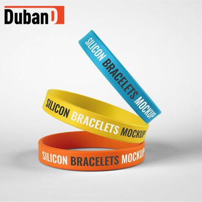 China Europe DUBAND Embossed Printed Adult Sports Bands Custom Silicone Wristbands For Sports for sale