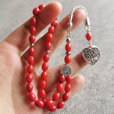 China Muslim Rosary Tasbeeh Misbaha Wholesale Prayer Tasbih Beads Religious Natural Red Islam Saudi Arabia Coral Oval 5.5*7.5mm 33 Tesbih for sale