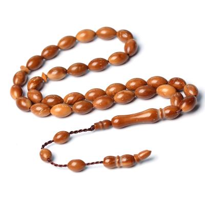 China Wholesale religious islamic natural seed prayer tasbih wood oval kuka shape 7*10mm muslim 33 beads sibha rosary misbaha for sale