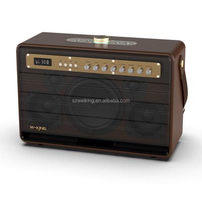 China Portable Wireless Phone Function W-KING Guitar Woofer Bluetooth Speaker with 2pcs Wireless Microphones for sale