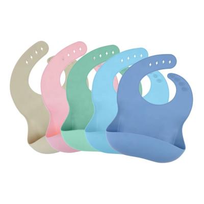 China Washable Silicone Baby Bibs Waterproof Feeding Bibs For Babies Baby Adjustable Bibs With Pocket Stops Spots for sale