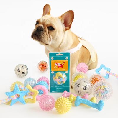 China Durable And Eco-friendly Material Candy Color Dog Chew Toys Durable Rubber Dog Toys For Aggressive Chewers With Cotton Fabric Rope for sale