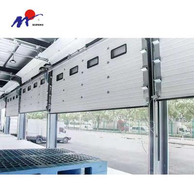 China Cheap price remote control thermal insulation dock seal industrial sectional door for sale