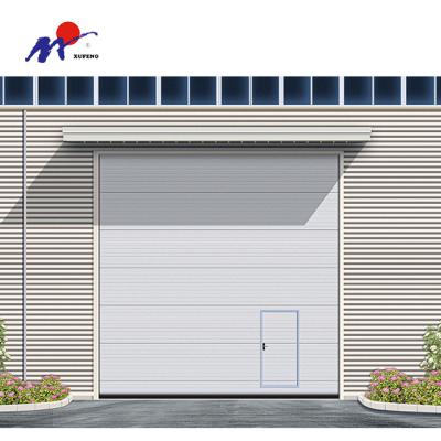 China Heat Insulation China New Design High Lifting Overhead Industrial Sectional Door for sale