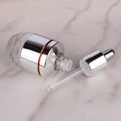 China Wick Cosmetic Empty Serum Dropper Bottles Pump Dropper Black With Packaging for sale