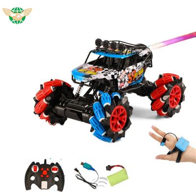 China 1:12 2.4G Alloy Body Protection Watch Gesture Sensor Remote Control Stunt Car 360 Degree Shakes Spray rc stunt car toy rc car for sale