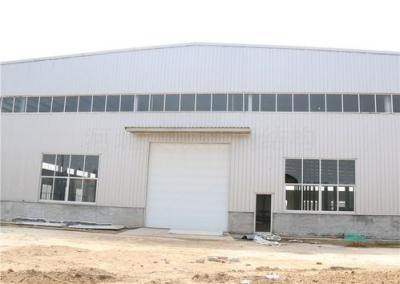 China Efficient Storage Solution Steel Structure Warehouse Hot Dip Galvanized With Rolling Door zu verkaufen