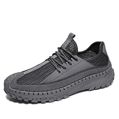 China 2023 Fashion New Fashion Men's Outdoor Walking Sports Large Size Handmade Breathable Lace Up Low Top Soft-soled Men's Sports Mesh Shoes for sale