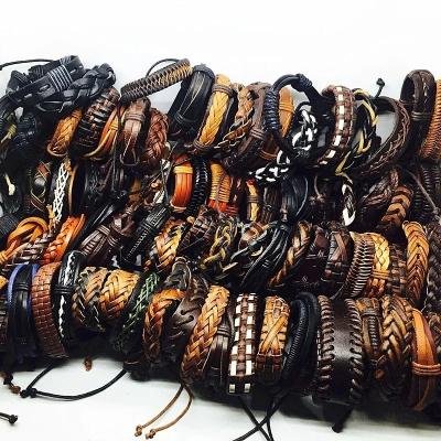 China Wholesale Personality Jewelry Bracelets 50pcs Pack Pendant Bracelets Lot Unfading Vintage Genuine Leather Men's Bracelet Unisex Alloy for sale