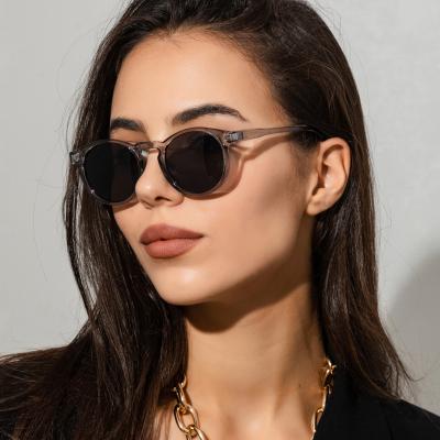 China Custom Designer Ladies Shades Sunglasses 2022 UV400 Lmamba Logo Retro Rivet Round Street Women Sunglasses for sale