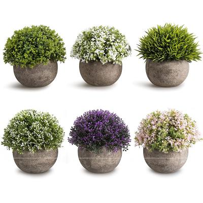 China Contemporary Plastic Mini Potted Artificial Plants Fake Grass Flower in Gray Pot for sale