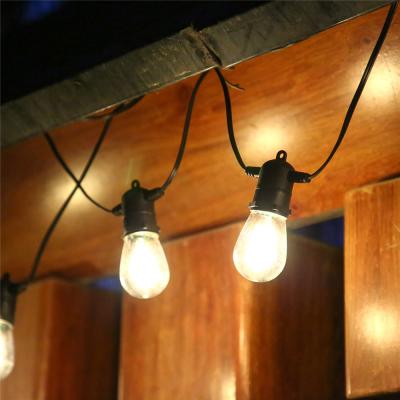 China Residential Christmas Outdoor Holiday Patio Garden S14 45Ft Solar String Lights with 15 Warm White LED Bulbs for sale