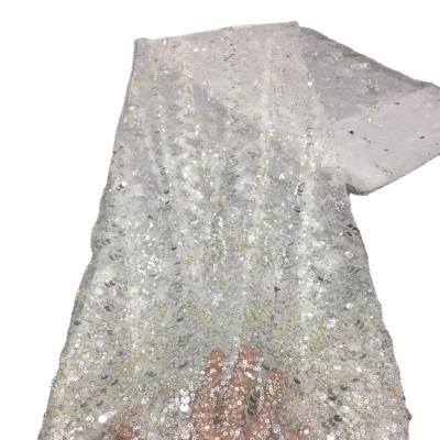 China Elastic Sequin Bridal Lace Bead French Tulle Lace Materials Beaded Lace Fabric For Wedding en venta