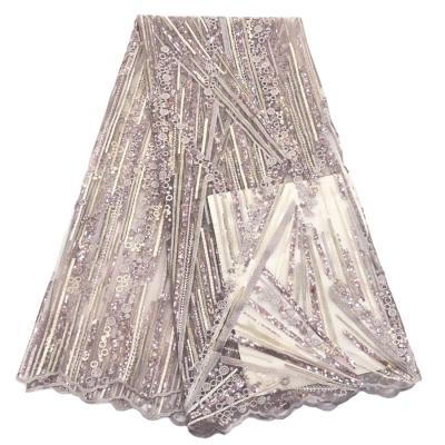 China Elastic Embroidered Geometry With Circle And Band French Tulle Sequin Lace Light Color Dress Material for sale